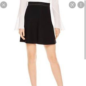 Sandro Knit Eyelet-detail A-line Skirt in Black. Size S.